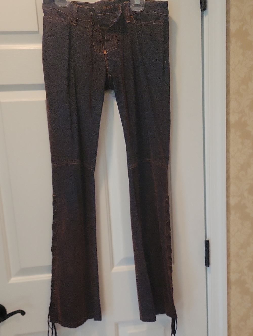 Vintage Let Me B brand jeans feature a unique dark wash denim